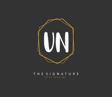 u n un eerste brief handschrift en handtekening logo. een concept handschrift eerste logo met sjabloon element. vector