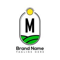 landbouw sjabloon Aan m brief. bouwland logo, agro boerderij, eco boerderij logo ontwerp met zon icoon concept vector