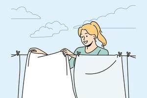 glimlachen vrouw hangende vers kleren Aan draad naar droog buitenshuis. gelukkig huisvrouw drogen kleding Aan het wassen lijn. huishouden en klusjes. vector illustratie.