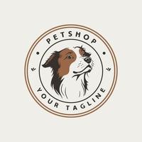 ronde huisdier winkel logo met schattig puppy hoofd in de midden- vector