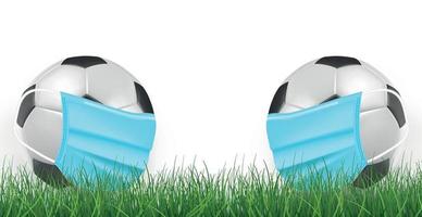 realistische voetballen in een medisch masker op een groen gazon achtergrond - vector