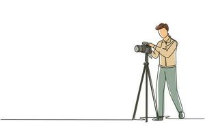 enkele doorlopende lijntekening fotograaf die foto's maakt met behulp van professionele apparatuurset, man met camera die foto's maakt. studio foto apparatuur. een lijn tekenen grafisch ontwerp vectorillustratie vector