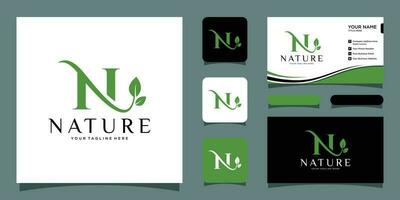 eerste brief n met blad luxe logo. groen blad logo met bedrijf kaart ontwerp premie vector