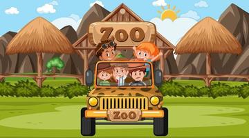 dierentuin bij dagtafereel met veel kinderen in een jeepauto