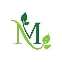 eerste brief m met blad luxe logo. groen blad logo sjabloon vector ontwerp.