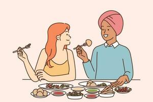 Indisch Mens en Kaukasisch vrouw zijn zittend Bij avondeten tafel proeverij traditioneel Indisch keuken met specerijen. multicultureel paar hebben avondeten samen in restaurant proeverij nationaal gerechten vector