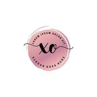 xo eerste brief handschrift logo met cirkel borstel sjabloon vector