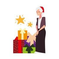 kerstmensen, oudere vrouw met kerstmuts en geschenkdozen die seizoensfeest vieren vector