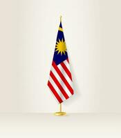 Maleisië vlag Aan een vlag stellage. vector