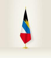 antigua en Barbuda vlag Aan een vlag stellage. vector