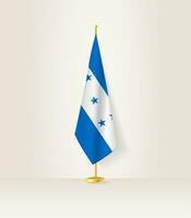 Honduras vlag Aan een vlag stellage. vector