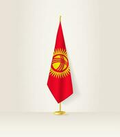 Kirgizië vlag Aan een vlag stellage. vector