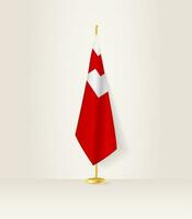 Tonga vlag Aan een vlag stellage. vector