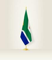 zuiden Afrika vlag Aan een vlag stellage. vector