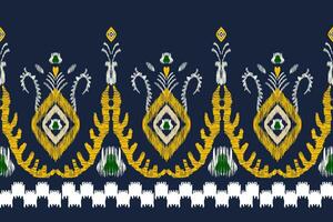 ikat vector etnisch naadloos patroon ontwerp. ikat aztec kleding stof tapijt ornamenten textiel decoraties behang.