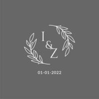 eerste brief iz monogram bruiloft logo met creatief bladeren decoratie vector