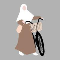 moslim vrouw met haar fiets vector