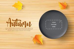 herfst achtergrond met realistische zwarte plaat over houten bord. vector