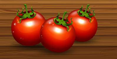 Een verse biologische tomaat op houten achtergrond vector