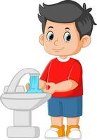 tekenfilm kleine jongen die zijn handen wast vector