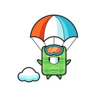 voetbalveld mascotte cartoon is aan het parachutespringen met een gelukkig gebaar vector