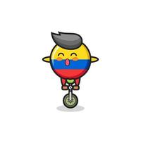 het schattige karakter van de vlag van Colombia rijdt op een circusfiets vector