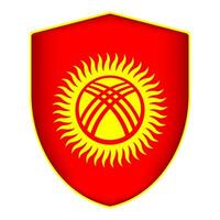 Kirgizië vlag in schild vorm geven aan. vector illustratie.