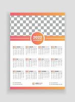 één pagina wandkalender ontwerp 2022. wandkalender ontwerp 2022. nieuwjaarskalender ontwerp 2022. week begint op maandag. sjabloon voor jaarkalender 2022 vector