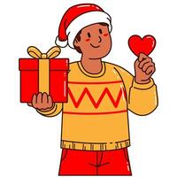 jongen in een de kerstman claus hoed Holding een geschenk doos en liefde vector