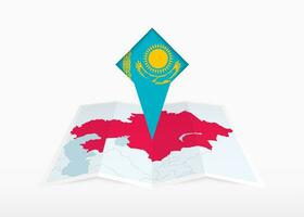 Kazachstan is afgebeeld Aan een gevouwen papier kaart en vastgemaakt plaats markeerstift met vlag van Kazachstan. vector