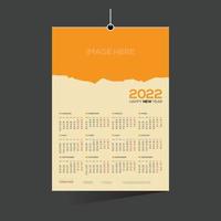 oranje gekleurde 12 maanden 2022 wandkalender vector