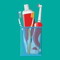 handleiding en elektrisch tandenborstel, tandpasta in glas. poetsen tanden. tandheelkundig apparatuur. hygiëne en mondverzorging. vector illustratie in vlak stijl