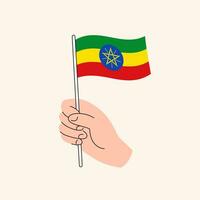 tekenfilm hand- Holding Ethiopisch vlag, geïsoleerd vector ontwerp.