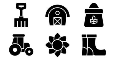 boerderij pictogrammen. vector grafiek met ontwerpen van schuur, tractor, hooivork, tarwe, laarzen, zonnebloem. icoon reeks in solide stijl