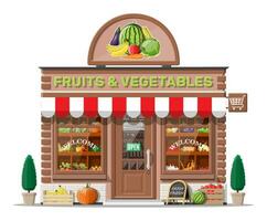 straat steen winkel gebouw buitenkant. fruit en groente op te slaan facade. vers biologisch voedsel producten. komkommer tomaat pompoen knoflook ui wortel maïs peper banaan. vector illustratie in vlak stijl