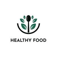gezond voedsel logo ontwerp concept met lepel en blad vector