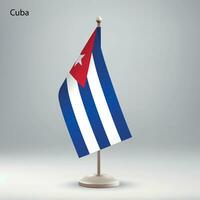 vlag van Cuba hangende Aan een vlag stellage. vector