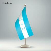 vlag van Honduras hangende Aan een vlag stellage. vector