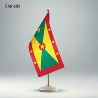 vlag van Grenada hangende Aan een vlag stellage. vector