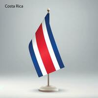 vlag van costa rica hangende Aan een vlag stellage. vector