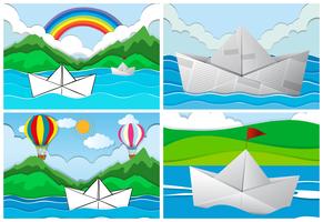 Vier scènes met papieren boten op zee vector