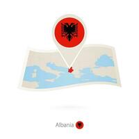 gevouwen papier kaart van Albanië met vlag pin van albanië. vector