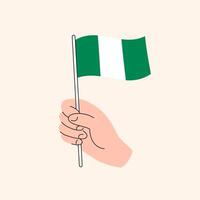 tekenfilm hand- Holding Nigeriaans vlag, geïsoleerd vector ontwerp