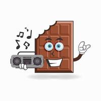 chocolade mascotte karakter met een radio. vector illustratie