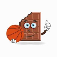 het karakter van de chocolademascotte wordt een basketbalspeler. vector illustratie