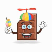 chocolade mascotte karakter met chocolade en kleurrijke hoed. vector illustratie