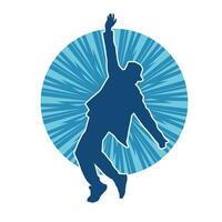 silhouet van een mannetje danser in actie houding. silhouet van een slank Mens in dansen houding. vector