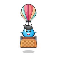 kauwgombal-mascotte rijdt in een heteluchtballon vector