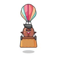 koffieboonmascotte die een heteluchtballon berijdt vector