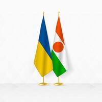 Oekraïne en Niger vlaggen Aan vlag stellage, illustratie voor diplomatie en andere vergadering tussen Oekraïne en Niger. vector